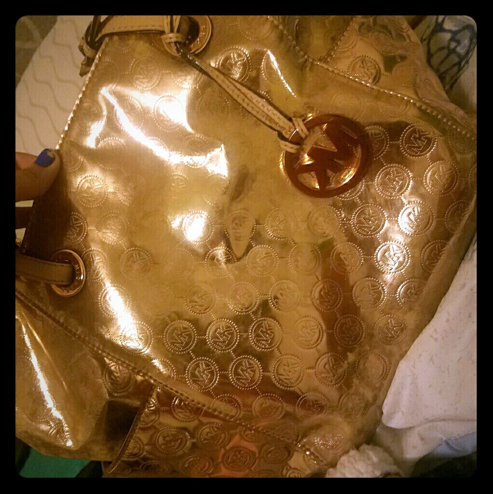 Gold micheal Kors purse